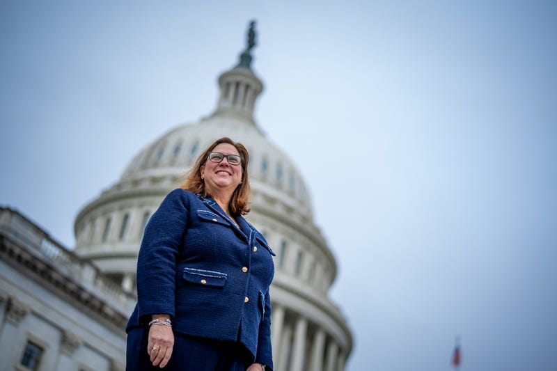 Congresswoman Julie Johnson stands in front of the U. S. Capitol