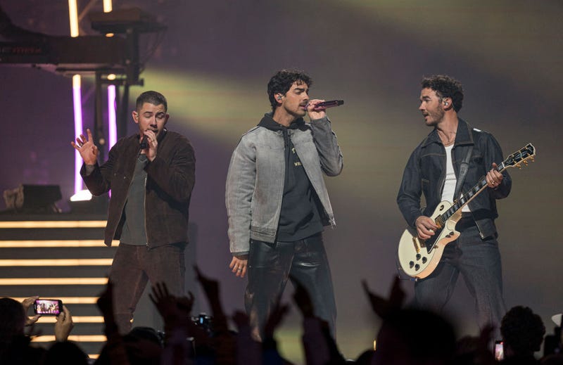 The Jonas Brothers perform during the half time show of the 2024 Grey Cup at BC