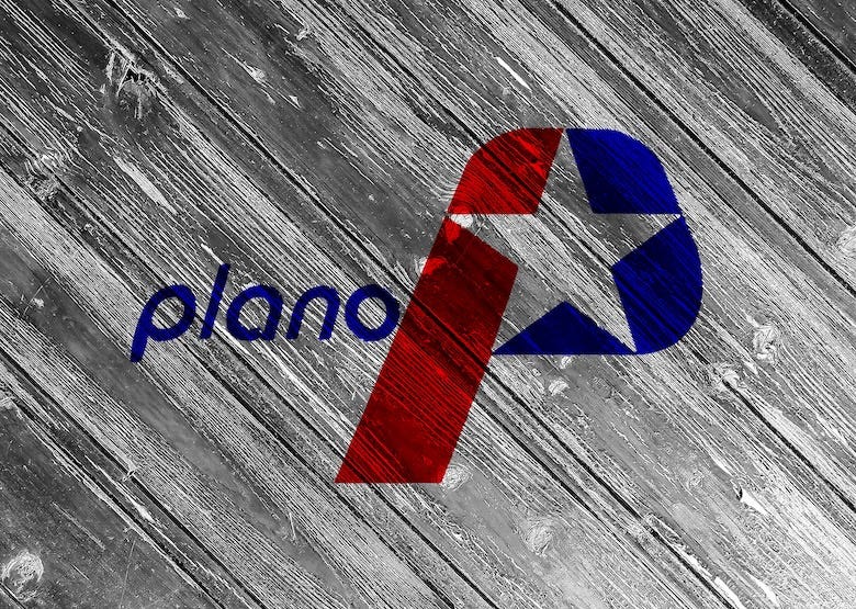 Flag of the city of Plano, Texas on a background of a wooden fence