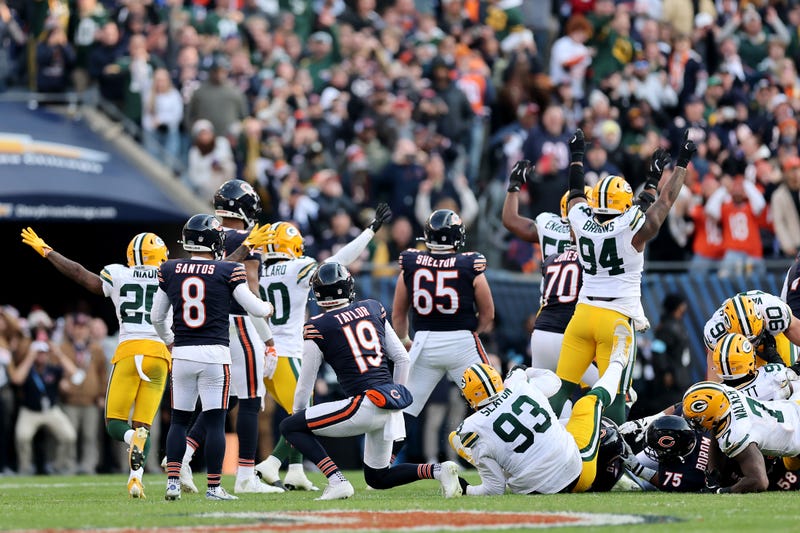 Cairo Santos, of the Chicago Bears, reacts as Karl Brooks, of the Green Bay Packers, celebrates with teammates after blocking a potential game winning field goal at the end of the fourth quarter of a game at Soldier Field on Nov. 17, 2024, in Chicago.