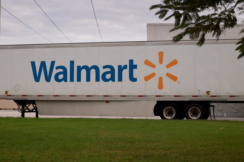  A Walmart sign is displayed on the side of a trailer 