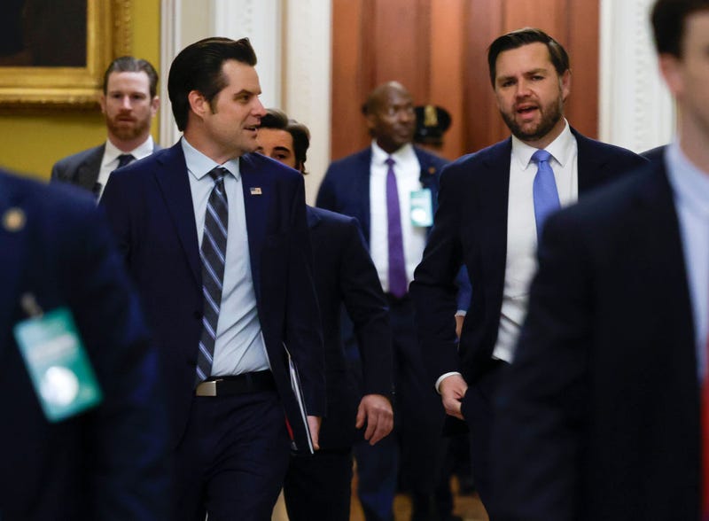 Former U.S. Rep. Matt Gaetz (R-Fla.), President-elect Donald Trump's nominee to be Attorney General, walks with Vice President-elect JD Vance as they arrive for meetings with senators at the U.S. Capitol on Wednesday.