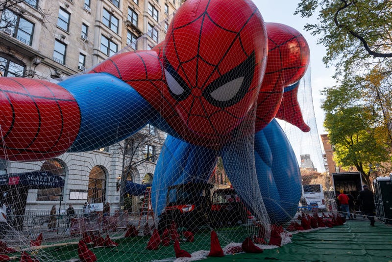 Workers participate in the annual balloon inflation for the 2024 Macy's Thanksgiving Day Parade on Nov. 27, 2024 in New York City.