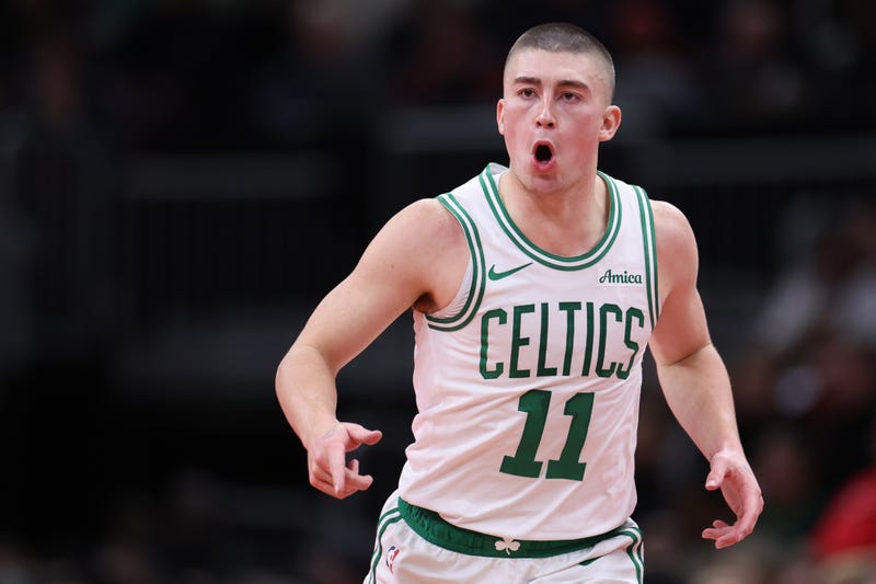 Payton Pritchard #11 of the Boston Celtics reacts after a made basket against the Chicago Bulls during the fourth quarter of the Emirates NBA Cup game at the United Center on November 29, 2024 in Chicago, Illinois.