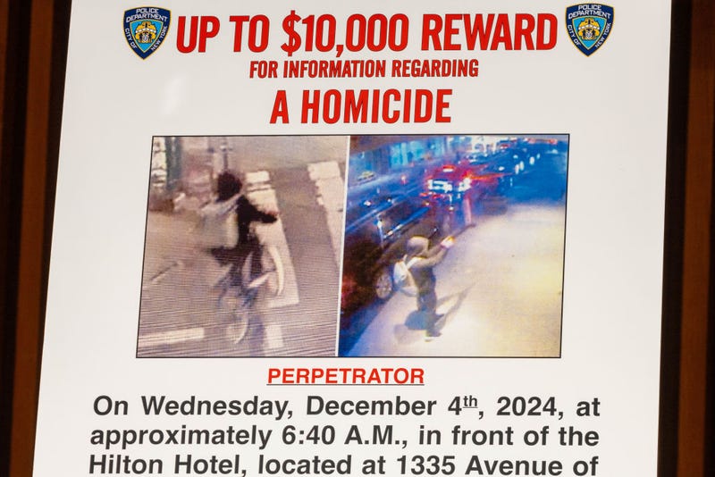 A wanted poster is set up for an NYPD press conference regarding a homicide that authorities believe was a targeted attack at One Police Plaza on December 4, 2024,