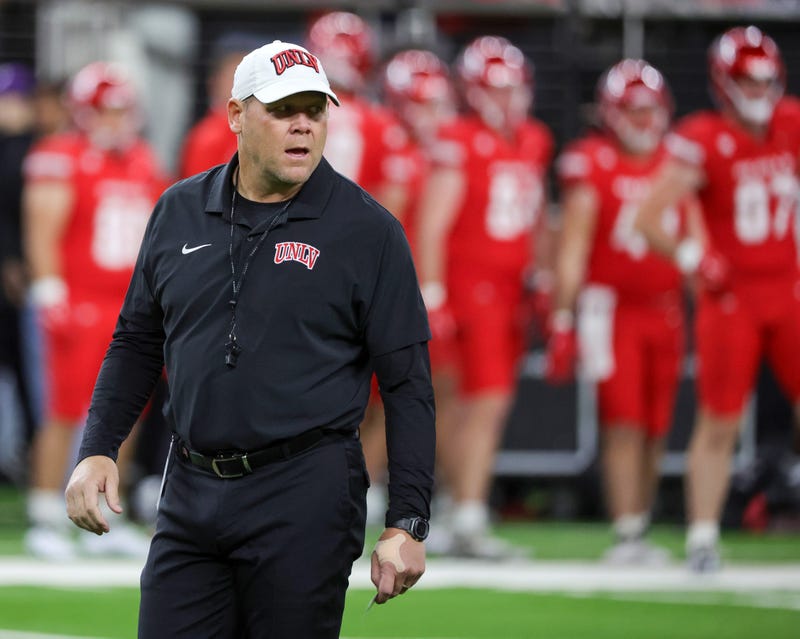 Head coach Barry Odom of the UNLV Rebels walks on the field during warmups before a game against the Nevada Wolf Pack at Allegiant Stadium on November 30, 2024 in Las Vegas, Nevada. The Rebels defeated the Wolf Pack 38-14.