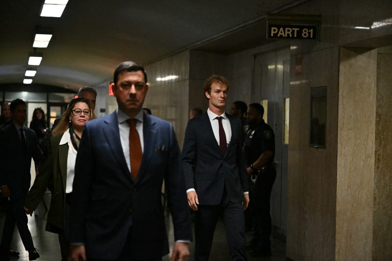 Daniel Penny (C) walks in the hallway at Manhattan Criminal Court as the jury deliberates in his manslaughter trial in connection with the chokehold death of Jordan Neely, in New York, December 6, 2024