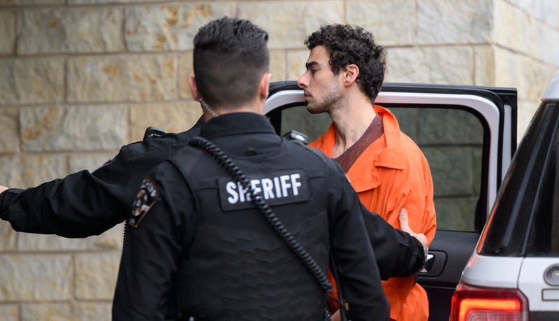Suspected shooter Luigi Mangione is led into the Blair County Courthouse for an extradition hearing on Dec. 10, 2024, in Hollidaysburg, Pennsylvania.