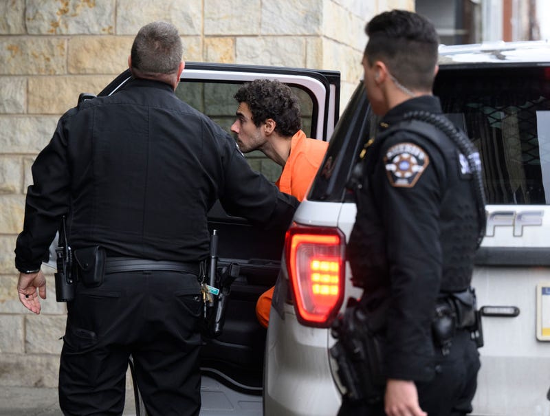 Suspected shooter Luigi Mangione is led into the Blair County Courthouse for an extradition hearing December 10, 2024 in Hollidaysburg, Pennsylvania.