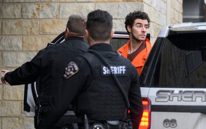 Suspected shooter Luigi Mangione is led into the Blair County Courthouse for an extradition hearing December 10, 2024 in Hollidaysburg, Pennsylvania. Mangione has been arraigned on weapons and false identification charges related to the fatal shooting of United Healthcare CEO Brian Thompson in New York City. Mangione is incarcerated in the State Correctional Institution in Huntingdon, Pennsylvania awaiting extradition to New York. 