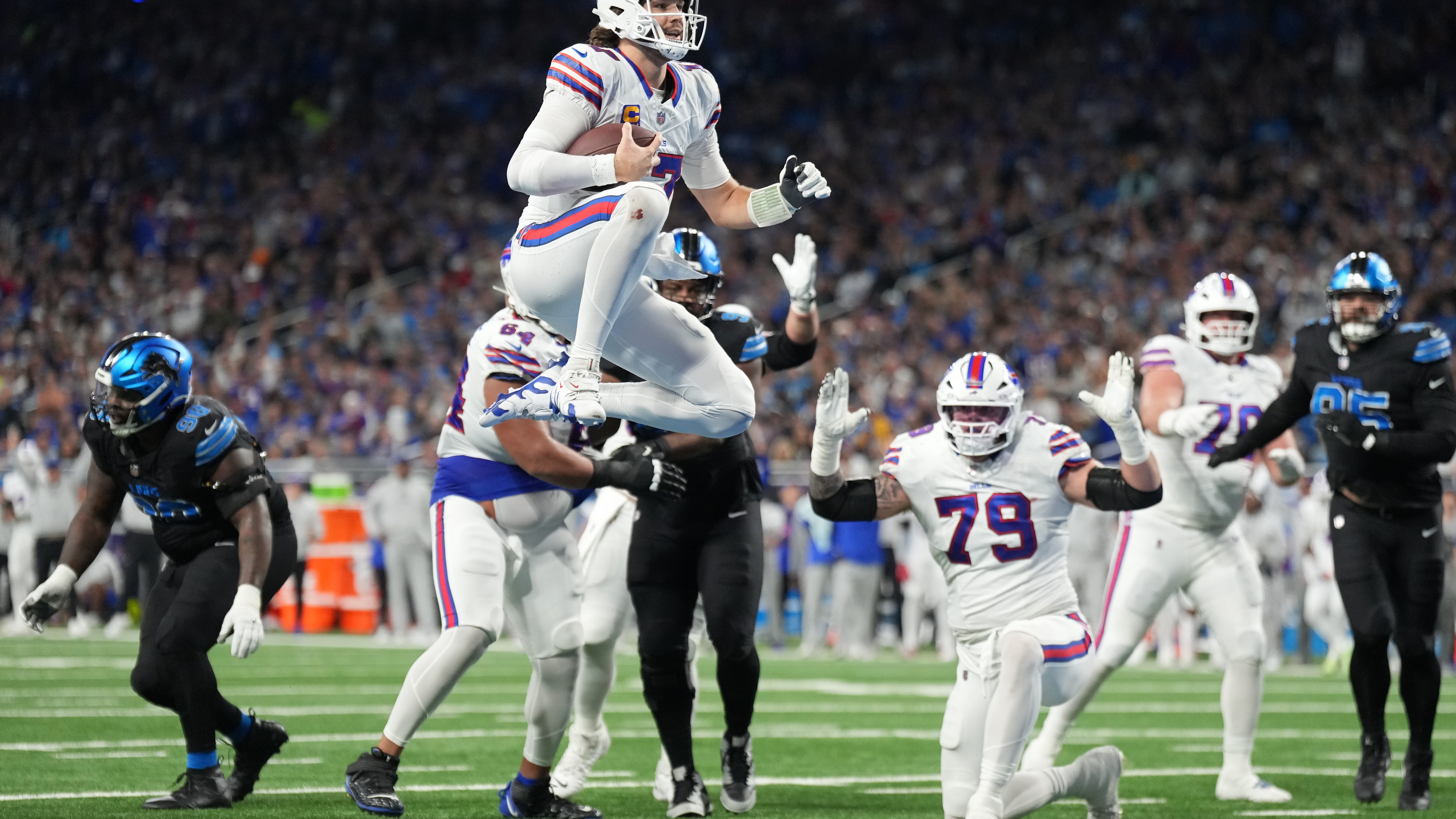 Bills motor to win over Lions in high-scoring bout