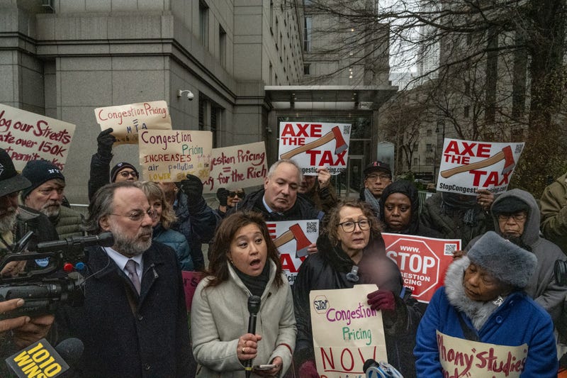 A coalition of community groups participate in a demonstration against Gov. Kathy Hochul's congestion pricing plan on December 20, 2024