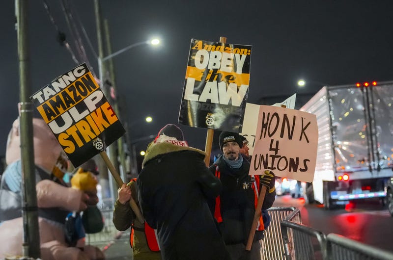 Amazon workers affiliated with the Teamsters Union continue a strike at the company's delivery hubs in Maspeth, Queens just days before Christmas on Dec. 20, 2024.