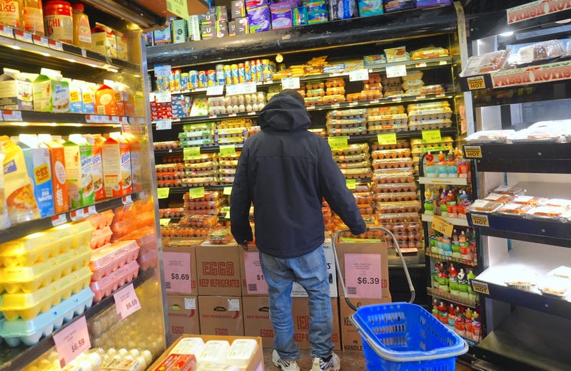 A customer shops in the egg section at a supermarket in Queens on Dec. 20, 2024. Egg prices have more than doubled because of culling to curb the bird flu