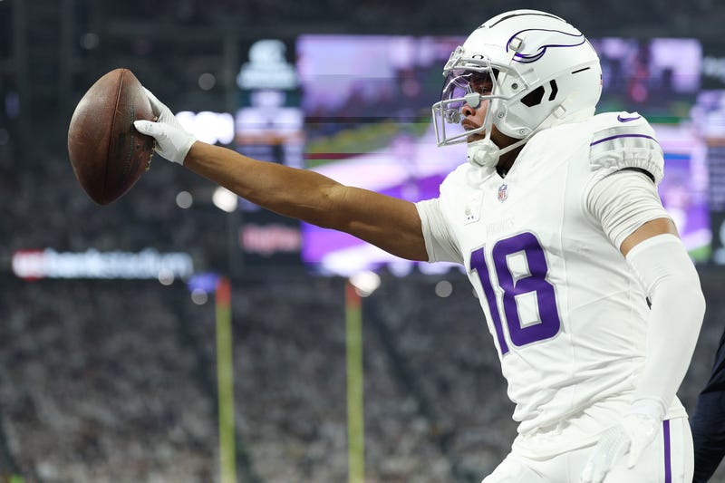 Justin Jefferson #18 of the Minnesota Vikings celebrates a first quarter touchdown against the Chicago Bears at U.S. Bank Stadium on December 16, 2024 in Minneapolis, Minnesota. 