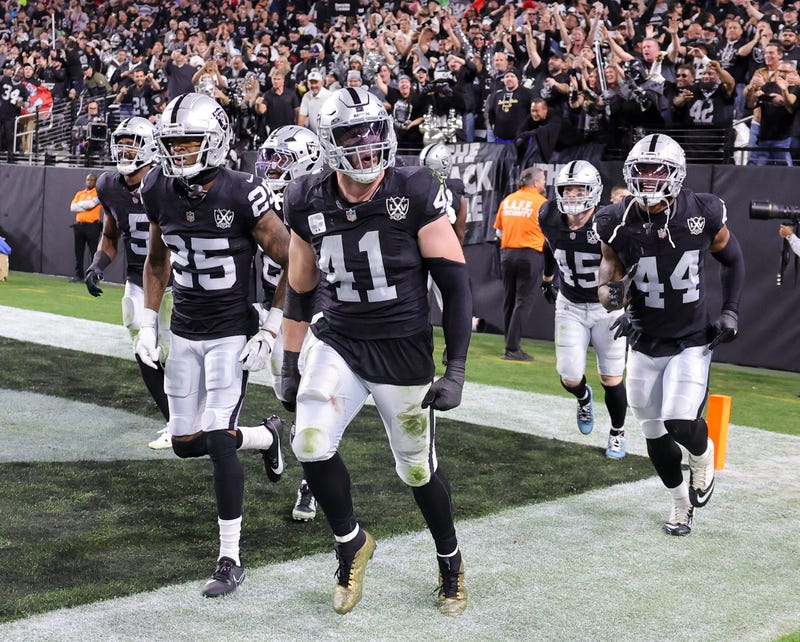 Robert Spillane #41 of the Las Vegas Raiders celebrates with teammates after intercepting a pass against the Atlanta Falcons in the third quarter of their game at Allegiant Stadium on December 16, 2024 in Las Vegas, Nevada. The Falcons defeated the Raiders 15-9.