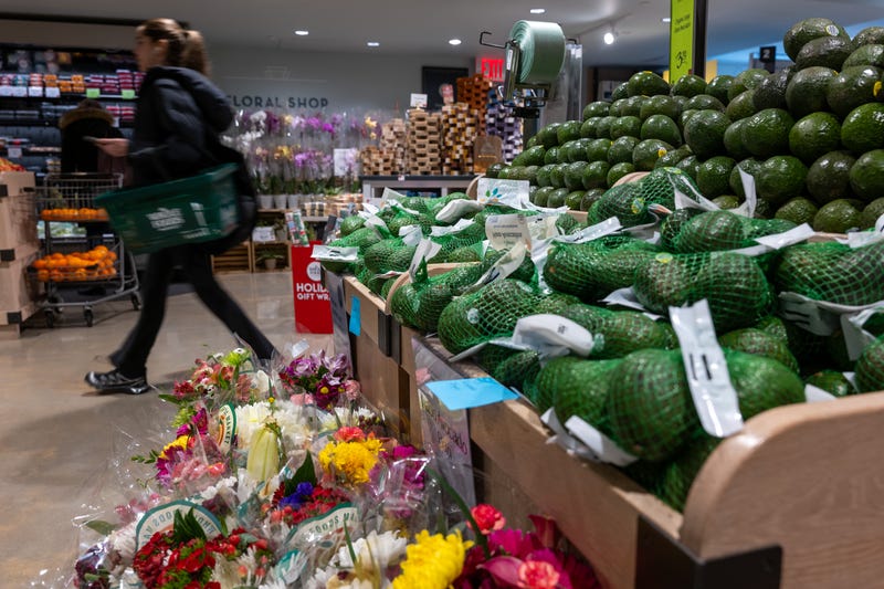 A person shops at a Whole Foods Market grocery store in New York City. 