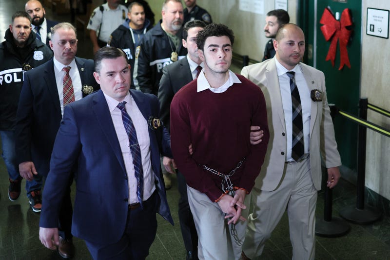 Luigi Nicholas Mangione is shackled as he arrives at Manhattan Criminal Court in New York on December 23, 2024