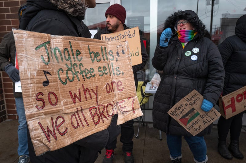 Workers picket outside of a Starbucks store on Dec. 20, 2024 in Chicago, Illinois. 