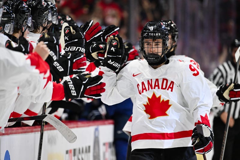 Gavin McKenna of Team Canada celebrates his goal with teammates on the bench during the first period at the 2025 IIHF World Junior Championship against Team Finland at Canadian Tire Centre December 26, 2024 in Ottawa, Ontario, Canada.