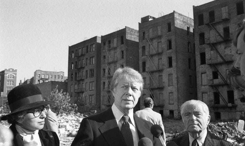 President Jimmy Carter speaks at a press conference along with Mayor Abe Beame, right, and Secretary of Housing and Urban Development Patricia Harris on Oct. 5, 1977, regarding the problems besieging the South Bronx