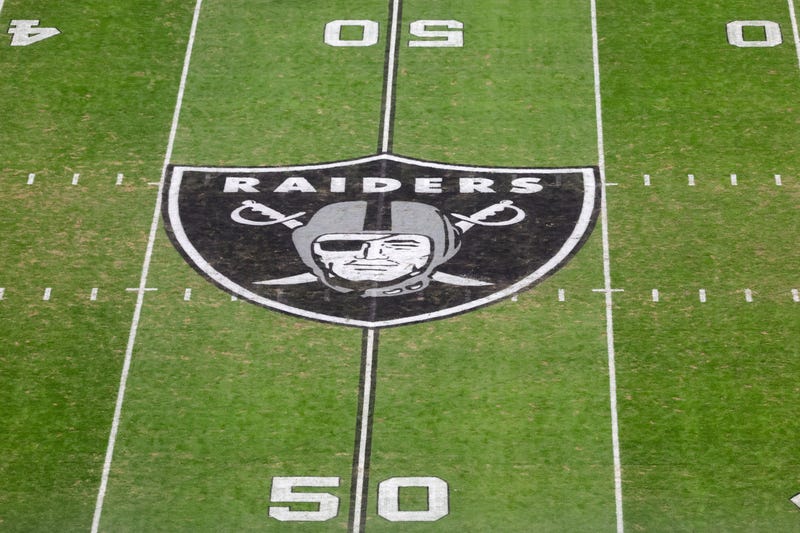 The Raiders logo on the field at Allegiant Stadium
