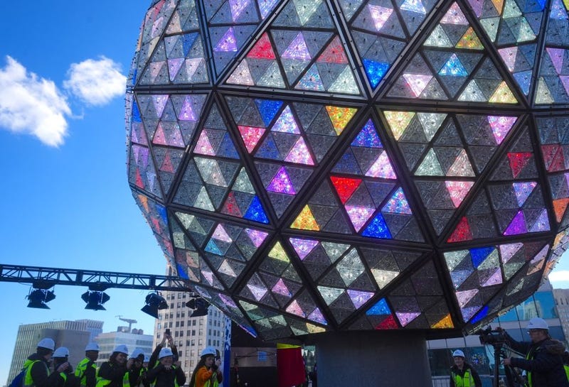 Times Square New Year's Eve Ball is illuminated and sent up the 139-foot pole atop One Times Square on Monday, December 30, 2024.