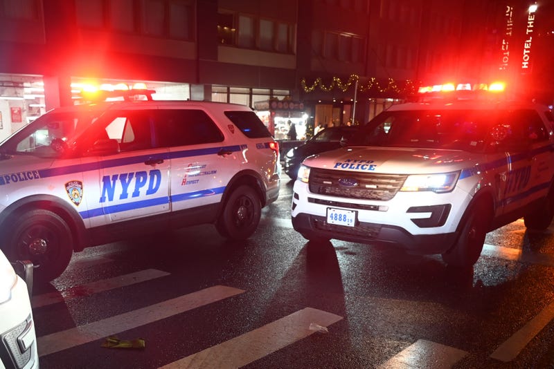 Police are seen on Eighth Avenue in Midtown
