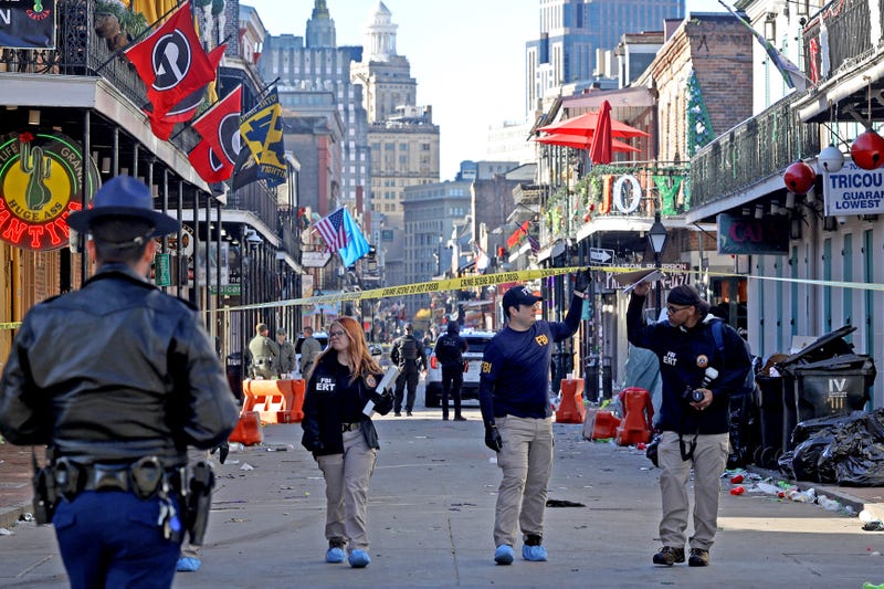 Law enforcement officers from multiple agencies work the scene on Bourbon Street after at least ten people were killed when a person allegedly drove into the crowd in the early morning hours of New Year's Day on January 1, 2025 in New Orleans, Louisiana. 