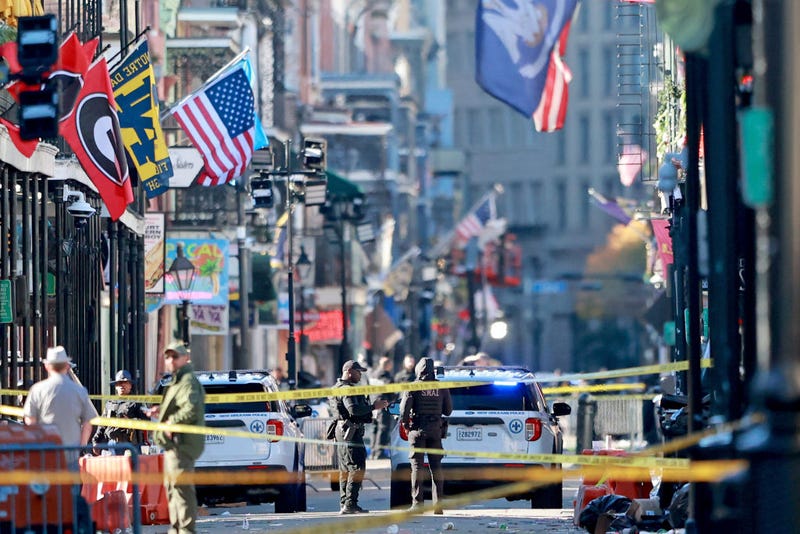Law enforcement officers from multiple agencies work the scene on Bourbon Street after at least ten people were killed when a person allegedly drove into the crowd in the early morning hours of New Year's Day on Jan. 1, 2025 in New Orleans.