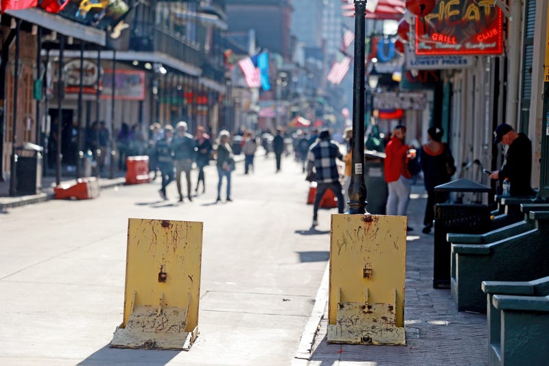 Movable vehicle barriers are positioned on Bourbon Street after the street was re-opened on Jan. 2, 2025, in New Orleans, Louisiana.