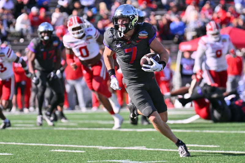 Wide receiver JP Richardson #7 of the TCU Horned Frogs runs for yardage against the Louisiana Ragin' Cajuns during the first half of the Isleta New Mexico Bowl at University Stadium on Dec. 28, 2024, in Albuquerque, New Mexico.