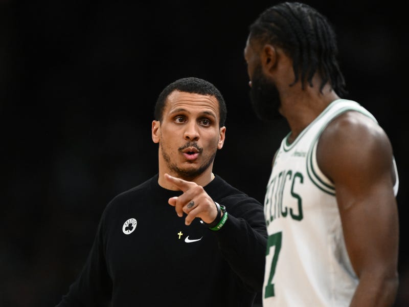 Head coach Joe Mazzulla of the Boston Celtics talks with Jaylen Brown #7 during the second quarter against the Indiana Pacers at the TD Garden on December 29, 2024 in Boston, Massachusetts