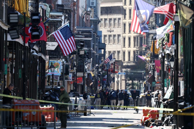 Members of the FBI and New Orleans Police work the scene on Bourbon Street after at least 10 people were killed when a person allegedly drove into a crowd in the early morning hours of New Year's Day on Jan. 1, 2025, in New Orleans, Louisiana.