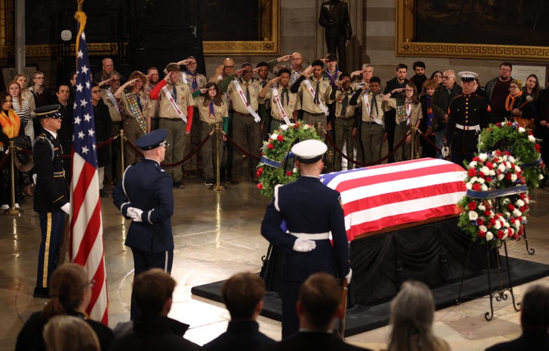 Scout troop salutes Carter casket