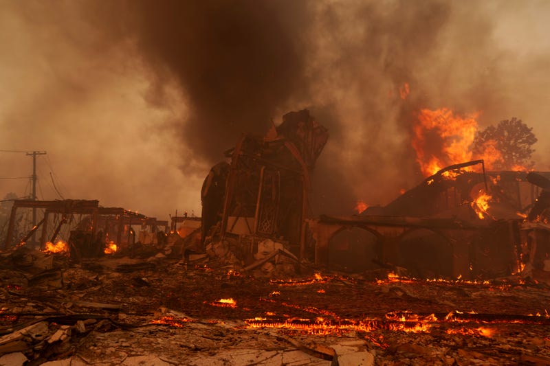 Flames from the Palisades Fire burn a church on January 8, 2025 in the Pacific Palisades neighborhood of Los Angeles, California. 