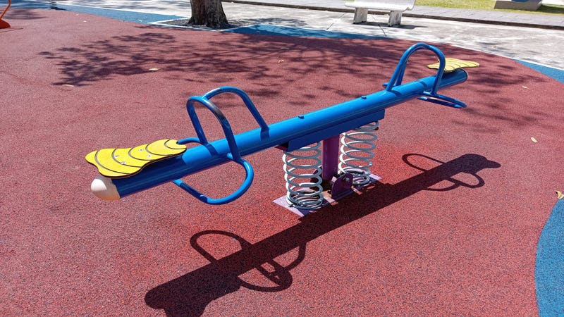 Children's playground on sunny summer day - stock photo