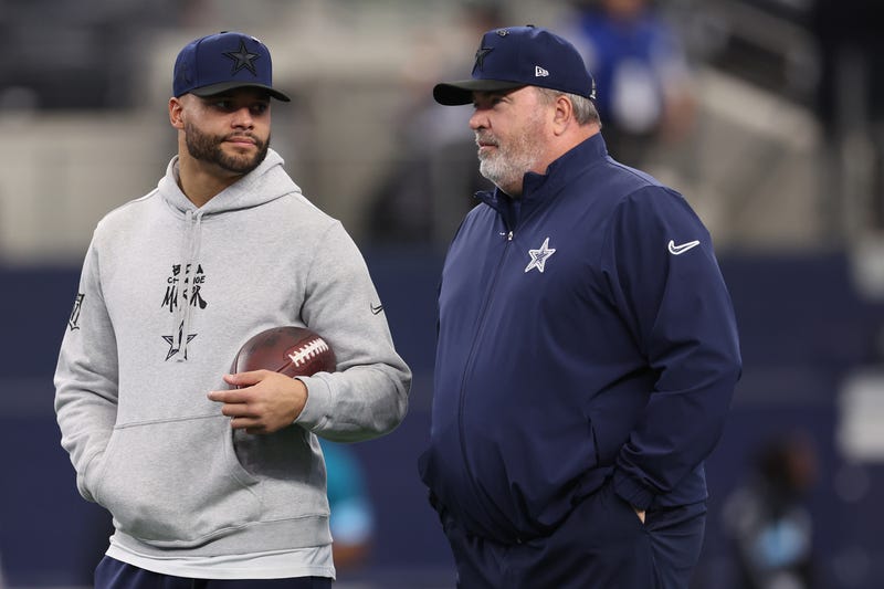 Dak Prescott #4 and head coach Mike McCarthy of the Dallas Cowboys talk prior to the game against the Washington Commanders at AT&T Stadium on Jan. 5, 2025, in Arlington, Texas.
