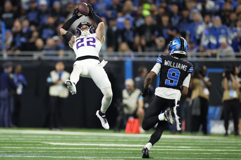 Harrison Smith #22 of the Minnesota Vikings intercepts a pass intended for Jameson Williams #9 of the Detroit Lions during the third quarter at Ford Field on January 05, 2025 in Detroit, Michigan.