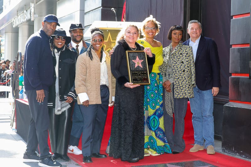 Denzel Washington, Pauletta Washington, Malcolm Washington, Katia Washington, Constanza Romero, guest, Danielle Deadwyler and Ted Sarandos, Co-CEO, Netflix speaks onstage as Pulitzer-Winning Playwright August Wilson is posthumously honored with a star on The Hollywood Walk of Fame on January 07, 2025