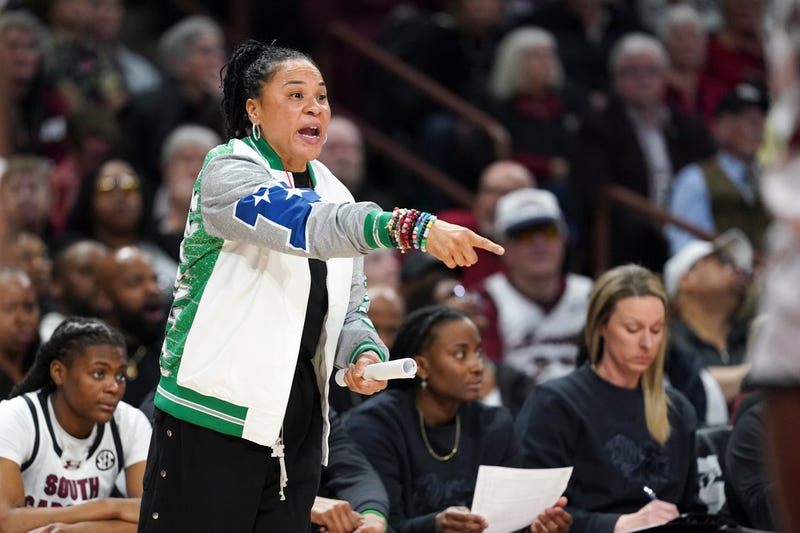 Head coach Dawn Staley of the South Carolina Gamecocks communicates with players during the fourth quarter of an NCAA women's basketball game against Texas Longhorns at Colonial Life Arena on January 12, 2024.