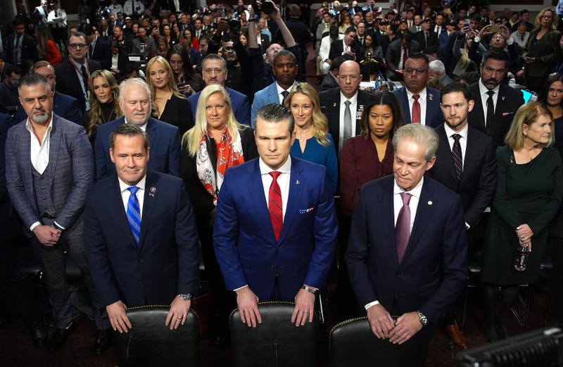 President-elect Donald Trump's nominee for Secretary of Defense Pete Hegseth arrives for his Senate Armed Services confirmation hearing on Capitol Hill, joined by former Senator Norm Coleman (R-MN). 
