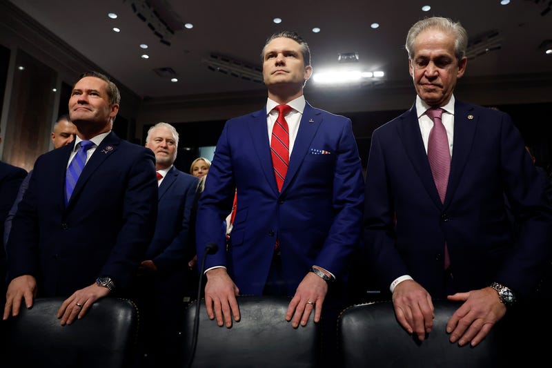 U.S. President-elect Donald Trump's nominee for Secretary of Defense Pete Hegseth arrives for his Senate Armed Services confirmation hearing on Capitol Hill. Hegseth was joined by Rep. Michael Waltz (R-FL) (L) and former Senator Norm Coleman (R-MN). 