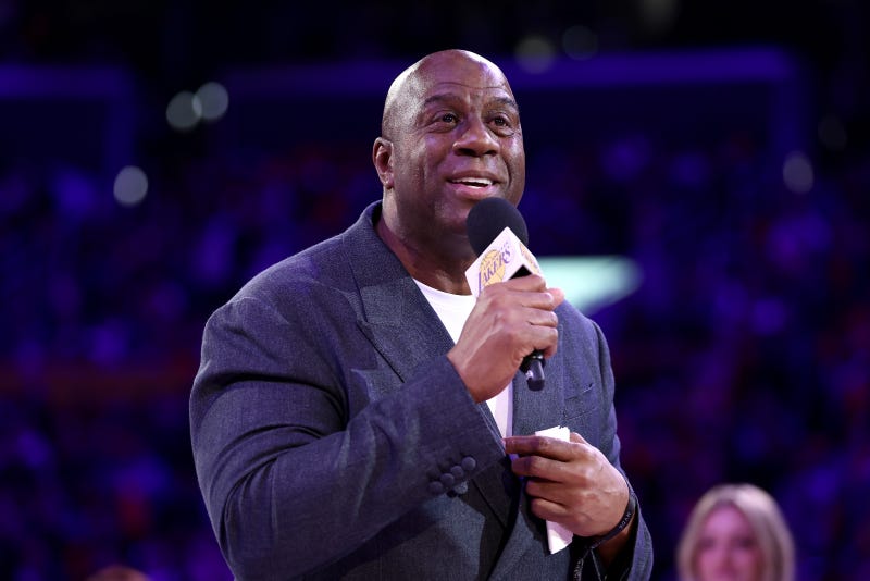 Magic Johnson speaks to the fans during the jersey retirement of Michael Cooper during halftime of the game between the Los Angeles Lakers and the San Antonio Spurs at Crypto.com Arena on January 13, 2025 in Los Angeles, California.
