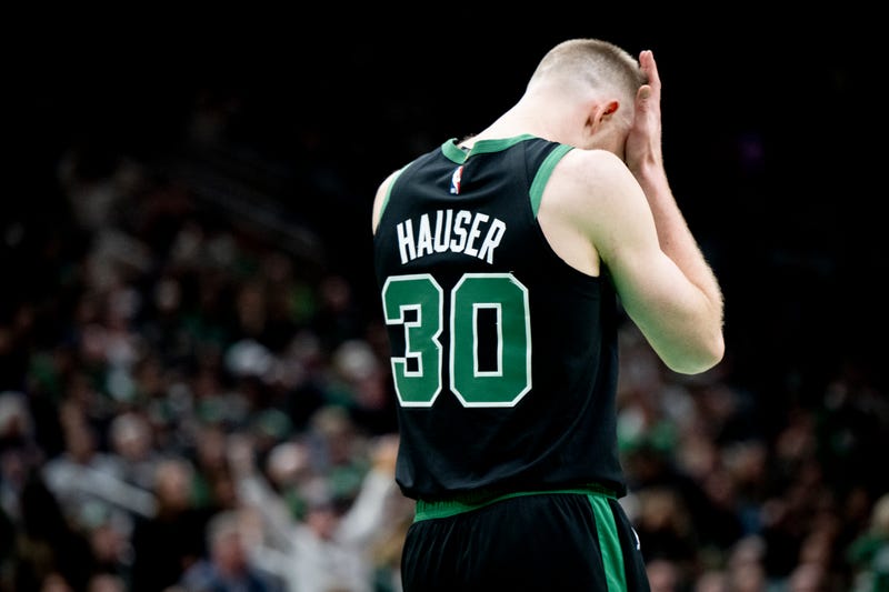 Sam Hauser #30 of the Boston Celtics react during the second half against the Atlanta Hawks at TD Garden on January 18, 2025 in Boston, Massachusetts.