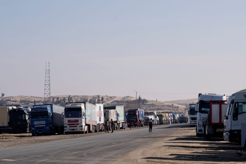 Aid trucks loaded with supplies for Gaza are queued in Al-Arish City on January 17, 2025 in Arish, Egypt