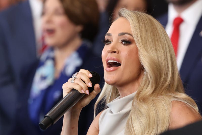: Carrie Underwood performs "America The Beautiful" during inauguration ceremonies in the U.S. Capitol Rotunda on January 20, 2025 in Washington, DC. Donald Trump takes office for his second term as the 47th president of the United States. (Photo by Kevin Lamarque - Pool/Getty Images)