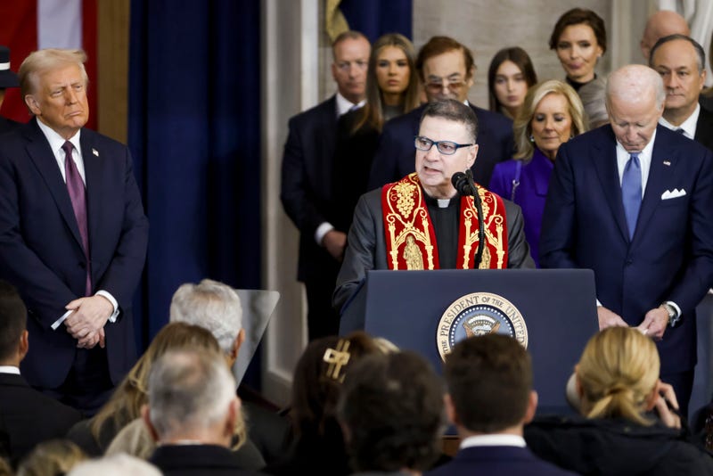  Rev. Father Frank Mann (C) of the Roman Catholic Diocese of Brooklyn delivers a benediction as US President Donald Trump (L) and former US President Joe Biden (R) listen during Trump's inauguration ceremony in the rotunda of the United States Capitol on January 20, 2025 in Washington, DC. Donald Trump takes office for his second term as the 47th President of the United States. (Photo by Shawn Thew-Pool/Getty Images)