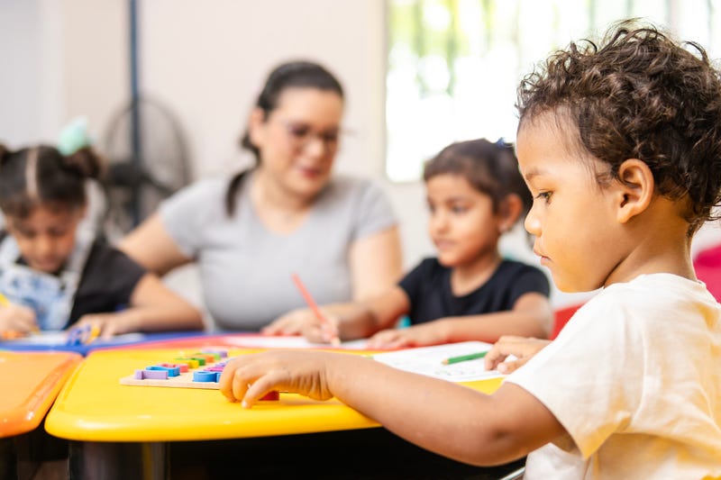 Students learning in preschool classrom