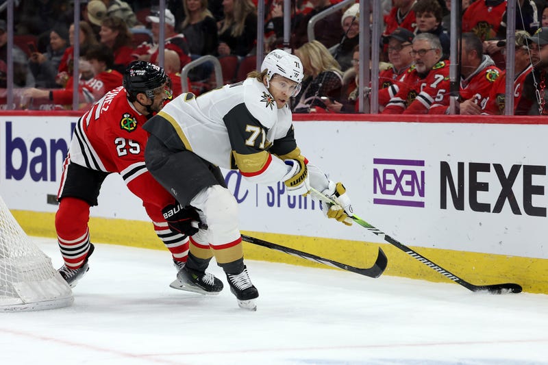 William Karlsson #71 of the Vegas Golden Knights handles the puck as Alec Martinez #25 of the Chicago Blackhawks defends during the first period at the United Center on January 18, 2025 in Chicago, Illinois.